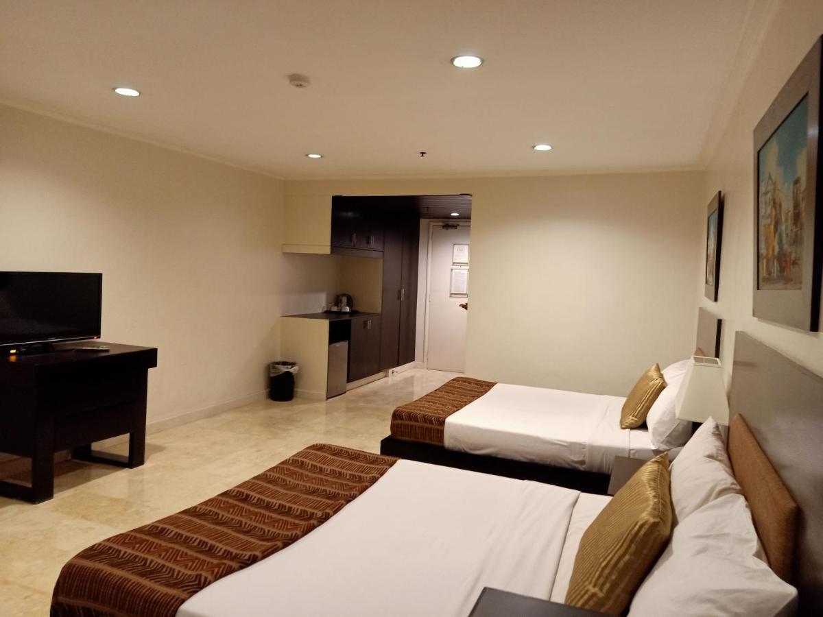 Paragon Tower Hotel Manila Exteriör bild